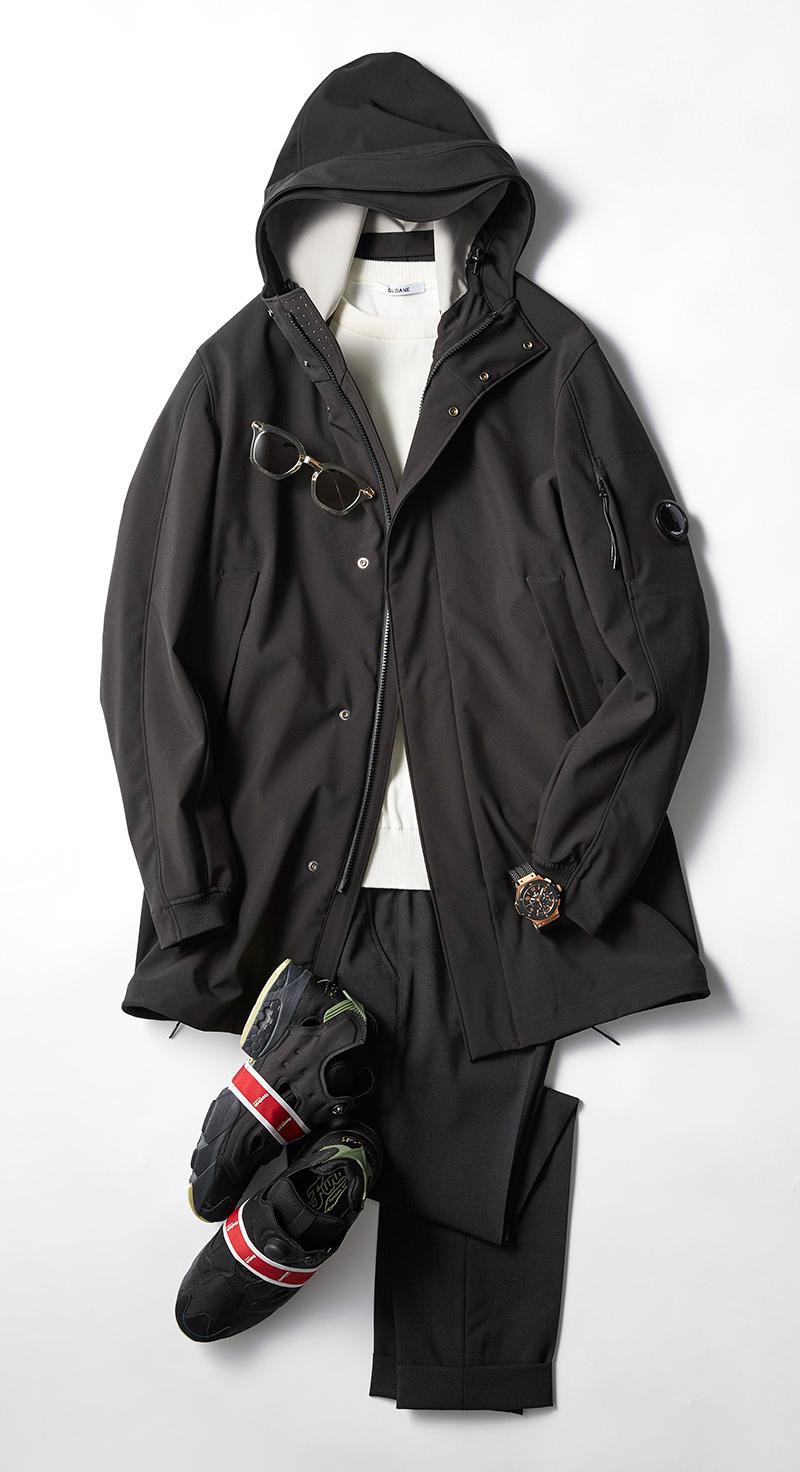 コート6万4500円／シーピー カンパニー（トライステイト・ジャパン）、ニット2万4000円／スローン、パンツ3万2000円／GTA（八木通商）、サングラス4万8000円／アイヴァン 7285（アイヴァン 7285 トウキョウ）