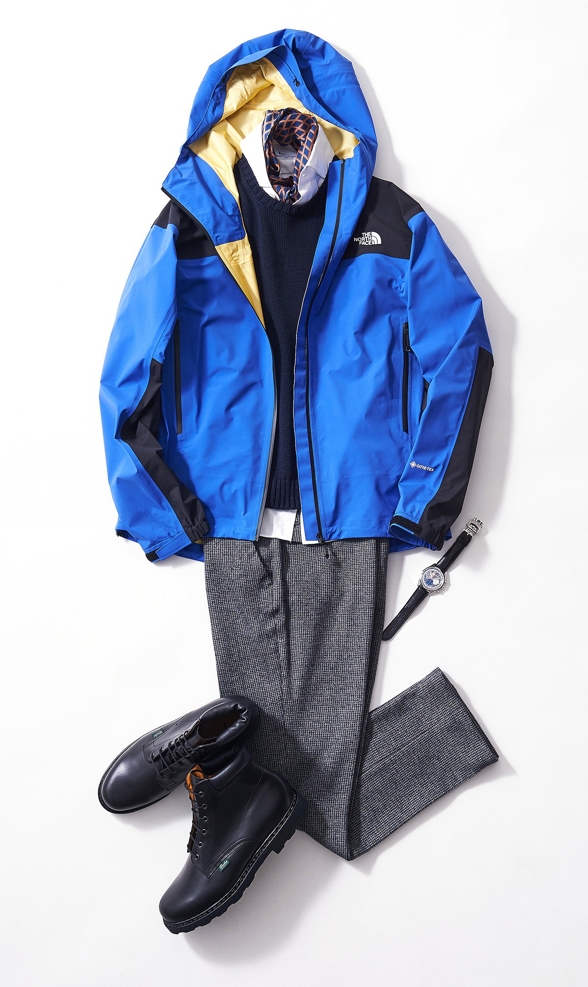ジャケット4万2000円/ザ・ノース・フェイス(ザ・ノース・フェイス マウンテン)、ニット3万6000円/ザノーネ、パンツ3万9000円/インコテックス(ともにスローウエアジャパン)、シャツ2万9000円/マリオ ムスカリエッロ(インテレプレ)、時計92万5000円/ゼニス、スカーフ1万9000円/カルーゾ(エストネーション)、ブーツ6万5000円/パラブーツ(パラブーツ 青山店)
