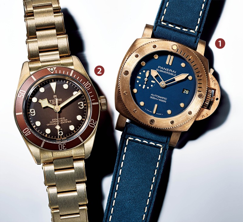 ▲ 右から、「サブマーシブル ブロンゾ ブルーアビッソ」自動巻き、ブロンズケース（42mm）、スエードストラップ（ラバーストラップが付属）。30気圧防水。ブティック限定。191万4000円／パネライ（オフィチーネ パネライ）、「ブラックベイ フィフティ-エイト ブロンズ」自動巻き、ブロンズケース（39mm）×ブレスレット（ファブリックストラップが付属）。200m防水。ブティック限定モデル51万4800円／チューダー（日本ロレックス / チューダー）