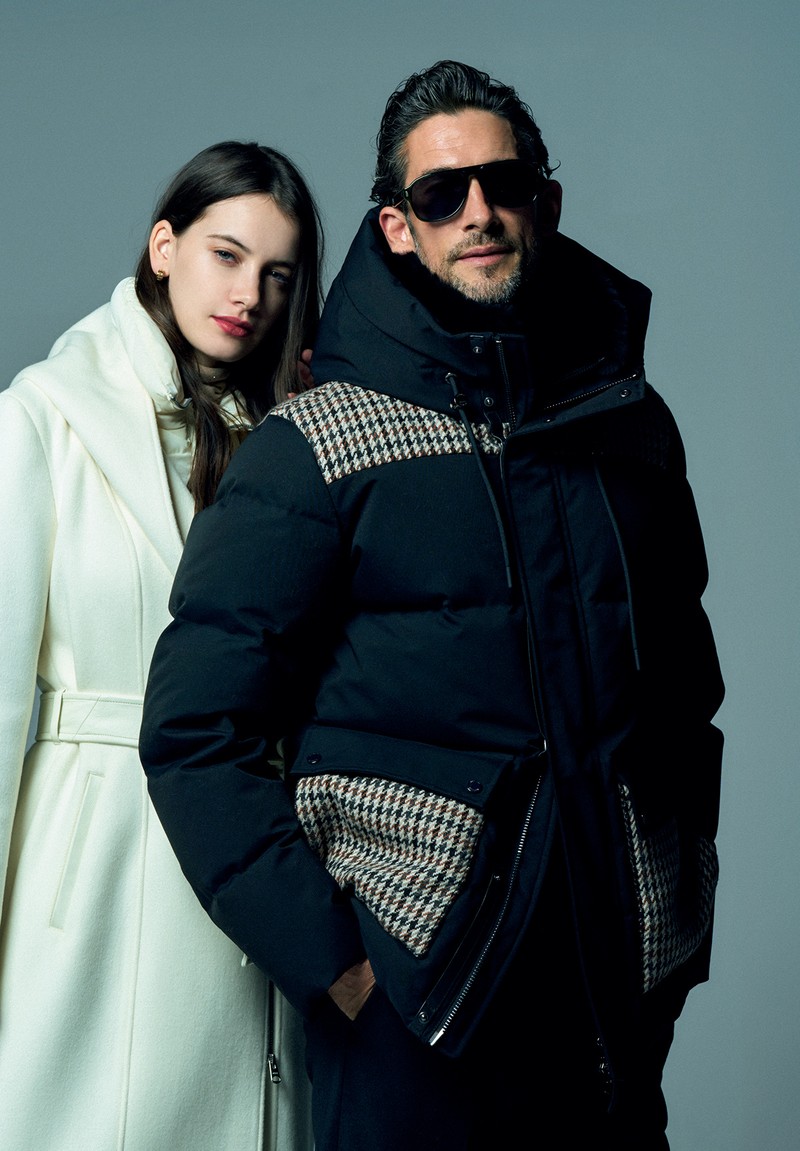 男性●ダウンジャケット25万3000円／マッカージュ（ジェイプラスインターナショナル）、パンツ4万4000円／ジェルマーノ（ビームス 六本木ヒルズ）、サングラス5万1700円／アイヴァン（アイヴァン 東京ギャラリー）　女性●ダウンコート21万7800円／マッカージュ（ジェイプラスインターナショナル）、ピアス41万4700円／ダミアーニ（ダミアーニ 銀座タワー）